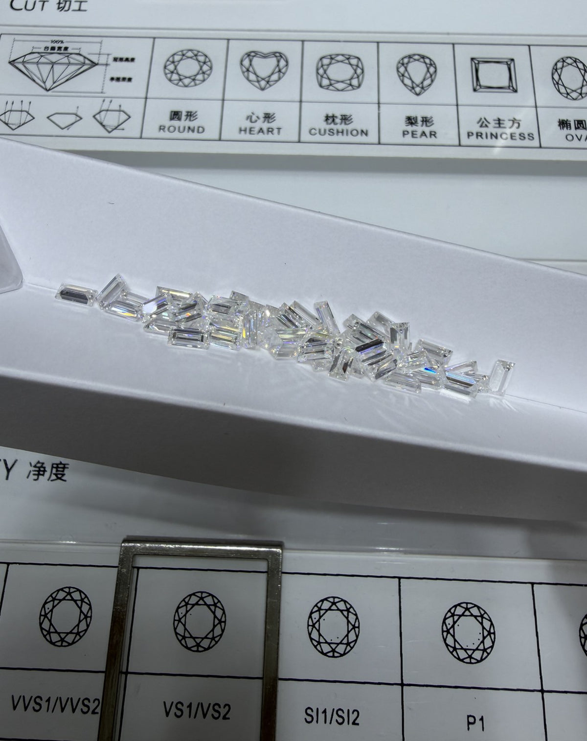 Baguette lab-grown diamond melee, DE VS-VVS, on an inspection tray