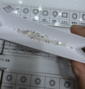 Emerald lab-grown diamond melee, DE VS-VVS, on an inspection tray