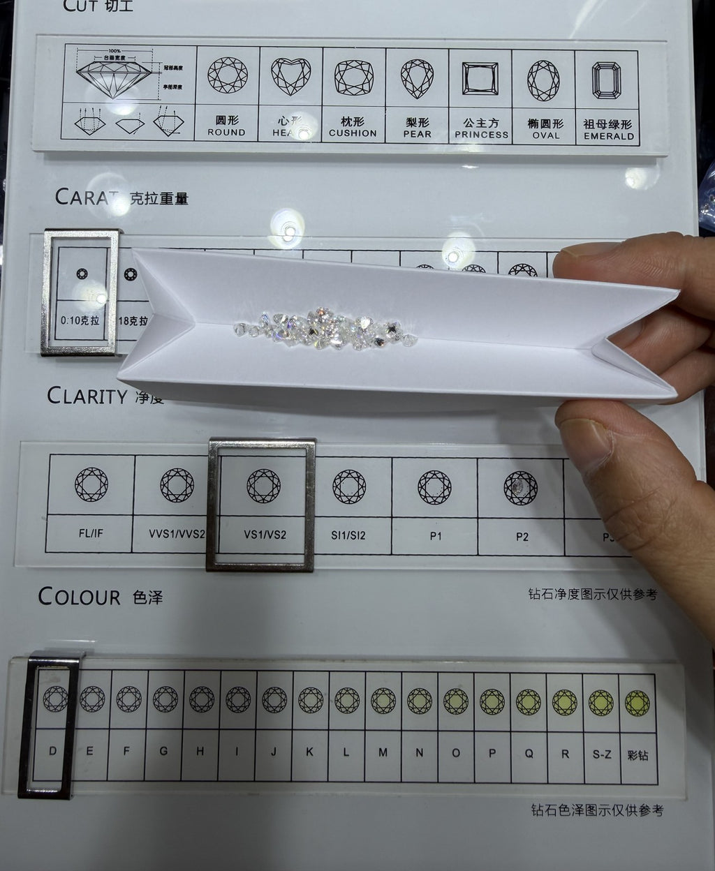 Heart lab-grown diamond melee, DE VS-VVS, on an inspection tray