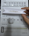 Trapezoid lab-grown diamond melee, DE VS-VVS, on an inspection tray
